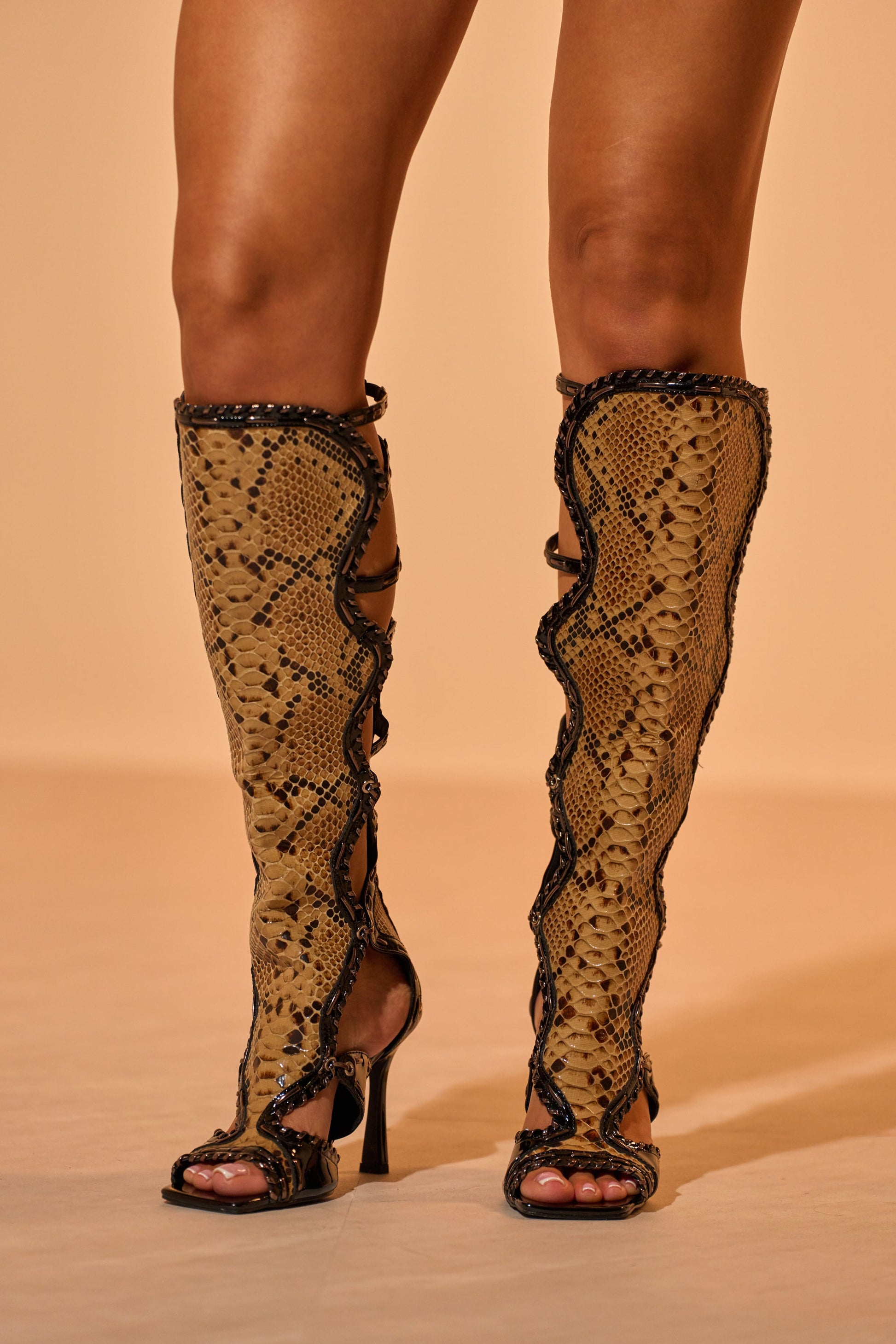 AKIRA GOLD INDRANI BLACK HIGH SHAFT GLADIATOR SANDAL