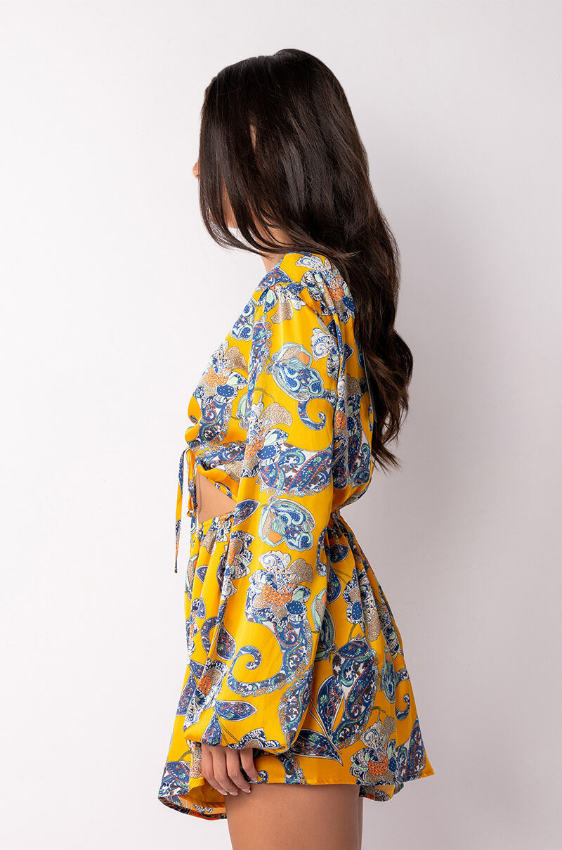 ADMIT IT LONG SLEEVE PRINTED ROMPER WITH CUT OUT